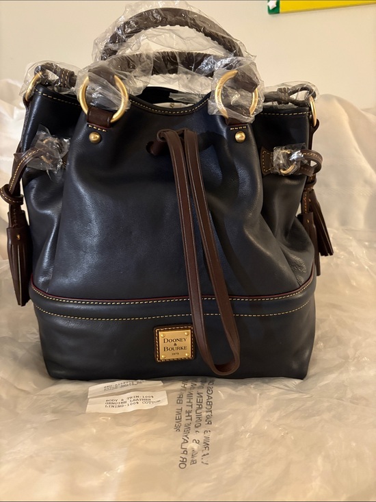 Dooney & Bourke Handbags - Dooney & Bourke Black Leather Bucket Tote with Brown Trim